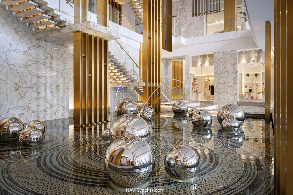 Dining room at Dinner by Heston Blumenthal inside Atlantis The Royal Dubai with kinetic pineapple sculpture centerpiece