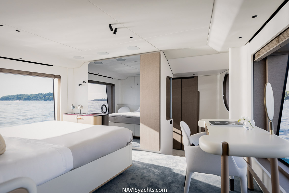 Main deck master suite with oversized windows and a generous bath in the Azimut Grande 26-meter yacht