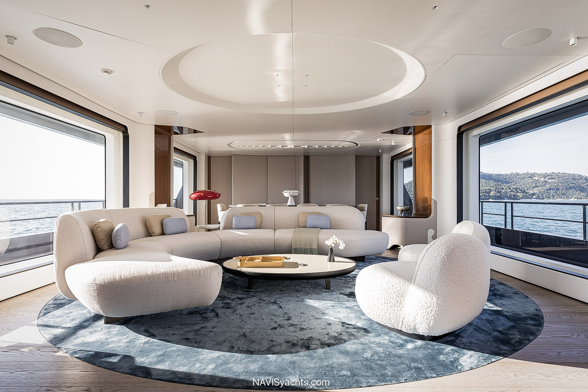 Azimut Grande 36M Main Salon – A luxurious yacht interior with floor-to-ceiling windows and custom-designed furnishings.