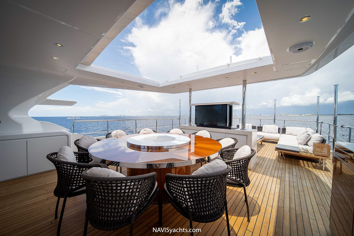 Upper deck lounge with a wide glass view.
