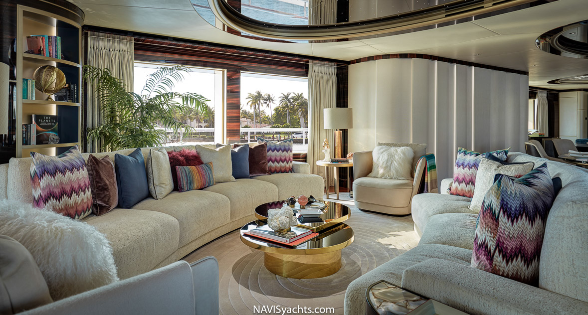 H2 Yacht Design and Feadship collaboration: Arrow's spacious main saloon featuring stylish furniture and oval-shaped areas