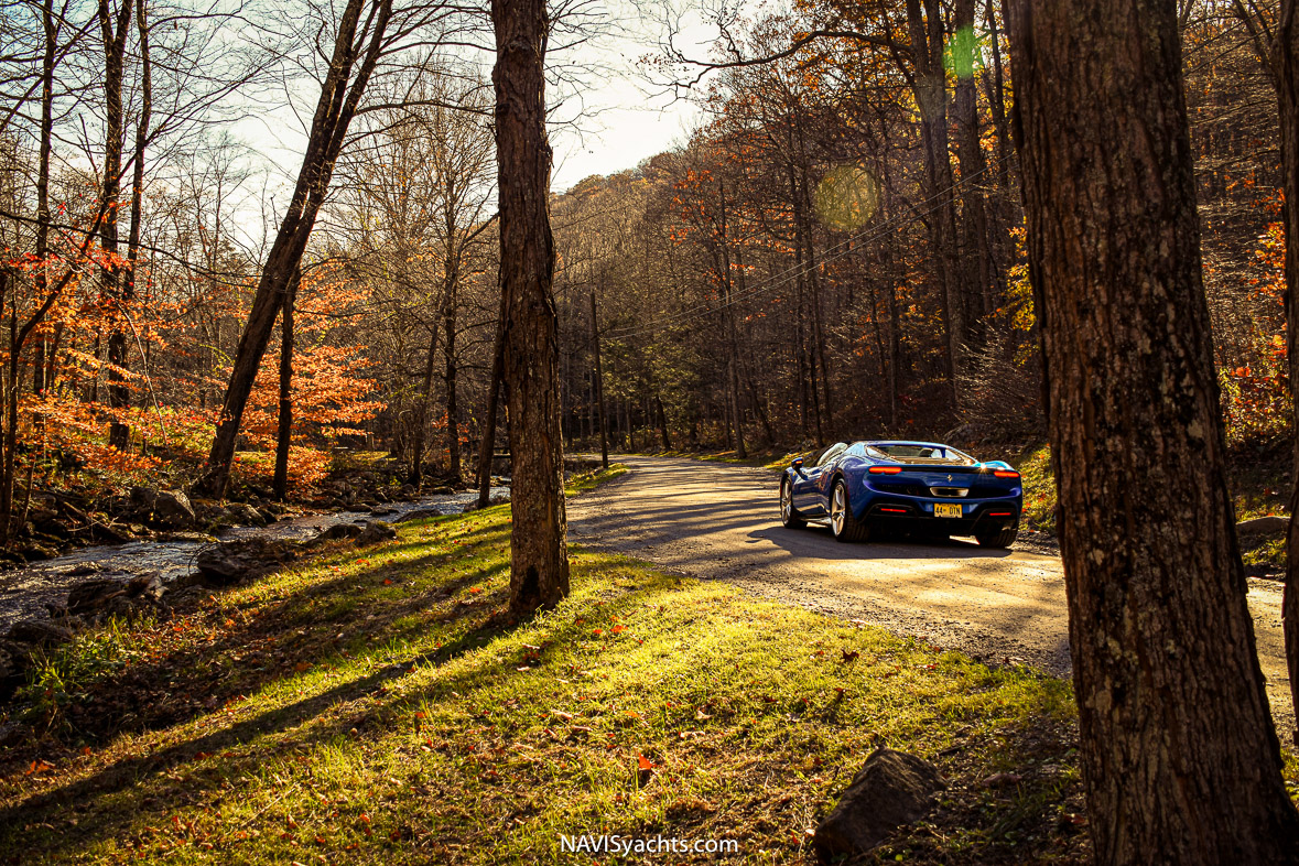 The Ferrari 296 GTS in Blu Corsa, ready for an unforgettable journey from New York City.