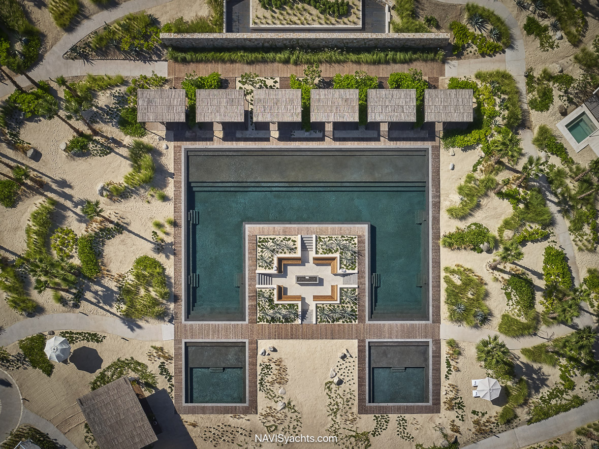 Four Seasons Los Cabos Infinity Pool – A luxurious infinity pool blending seamlessly with the golden sands and turquoise waters.