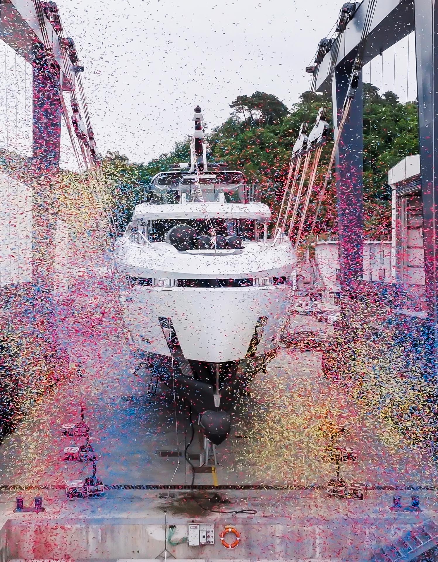 NAVIS Writer Custom Gem Show thinking The 40-metre Baglietto DOM133 superyacht 'Andala' during its launch ceremony at the La Spezia shipyard, being lowered into the water.