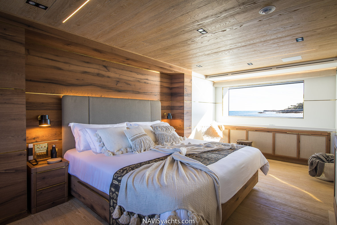 Full beam master suite with natural light and ocean views