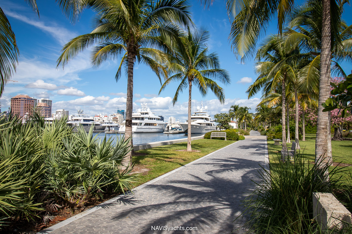 Pristine view of the Palm Beach Marina, showcasing docks with luxury yachts and the clear blue Florida skies.