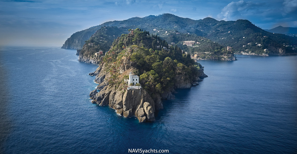 Aerial view of the enchanting bay of Portofino, the jewel of the Italian Riviera, with its vibrant piazzetta and unspoiled harbor.