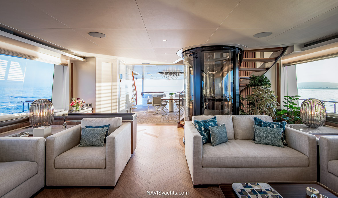 Luxury interior of Special One yacht with walnut joinery and bespoke furnishings in the owner’s suite