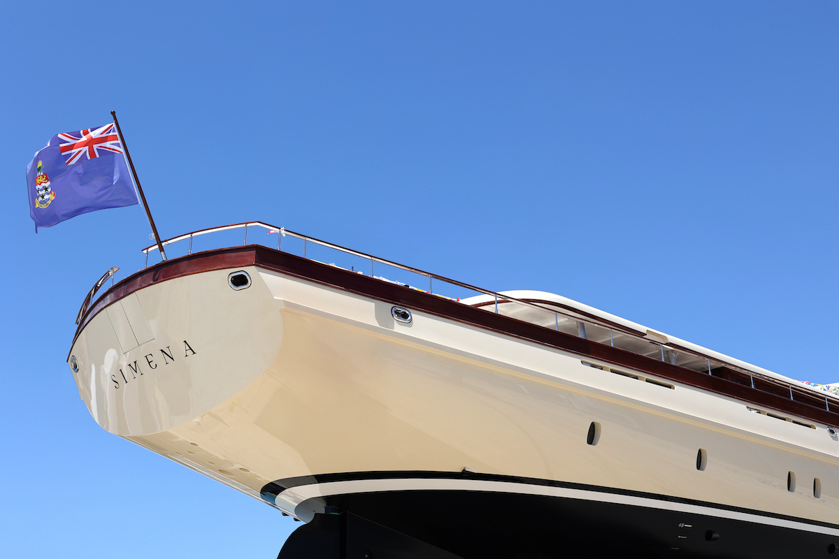 The 62-meter classic sailing ketch SIMENA from ARES Yachts under full sail on the ocean, showcasing its towering masts and elegant lines.