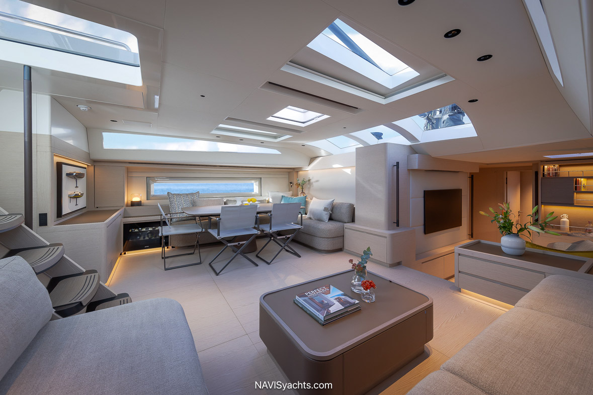 Liberty’s Interior Saloon – The elegantly designed main saloon featuring luxurious wood veneer and panoramic views.