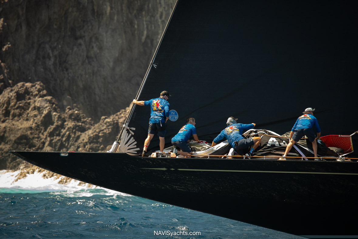 Image of sailors preparing yachts for the St. Barths Bucket Regatta, showcasing the bustling activity and excitement of the event.