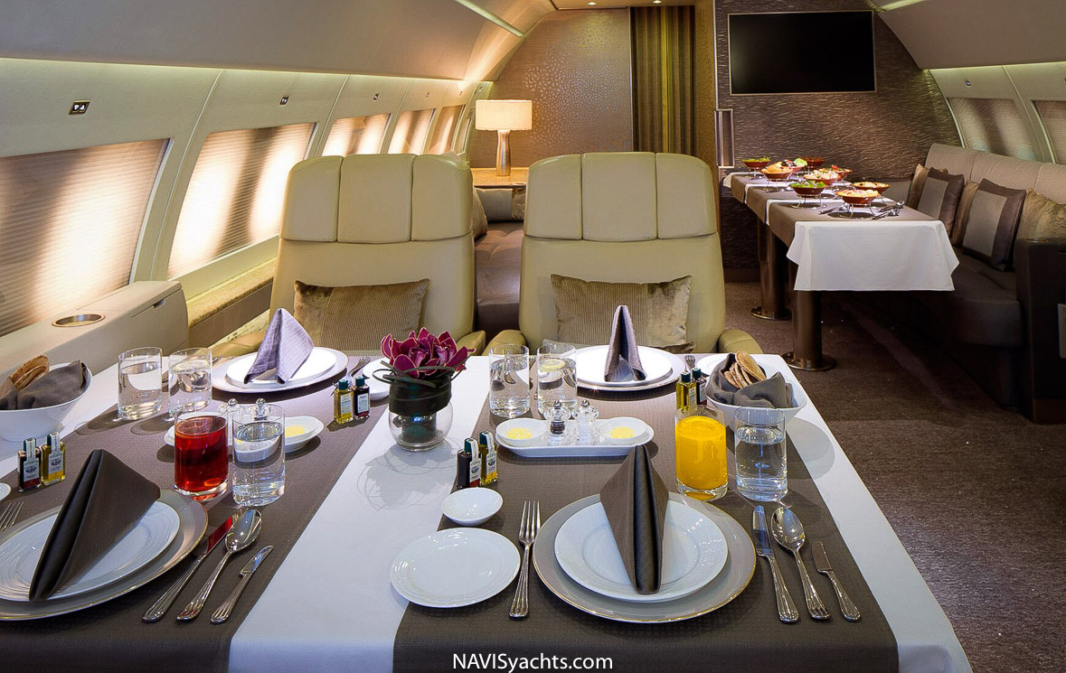 Luxurious interior of Emirates A319 Executive Private Jet, showcasing private suites for the ultimate luxury safari experience